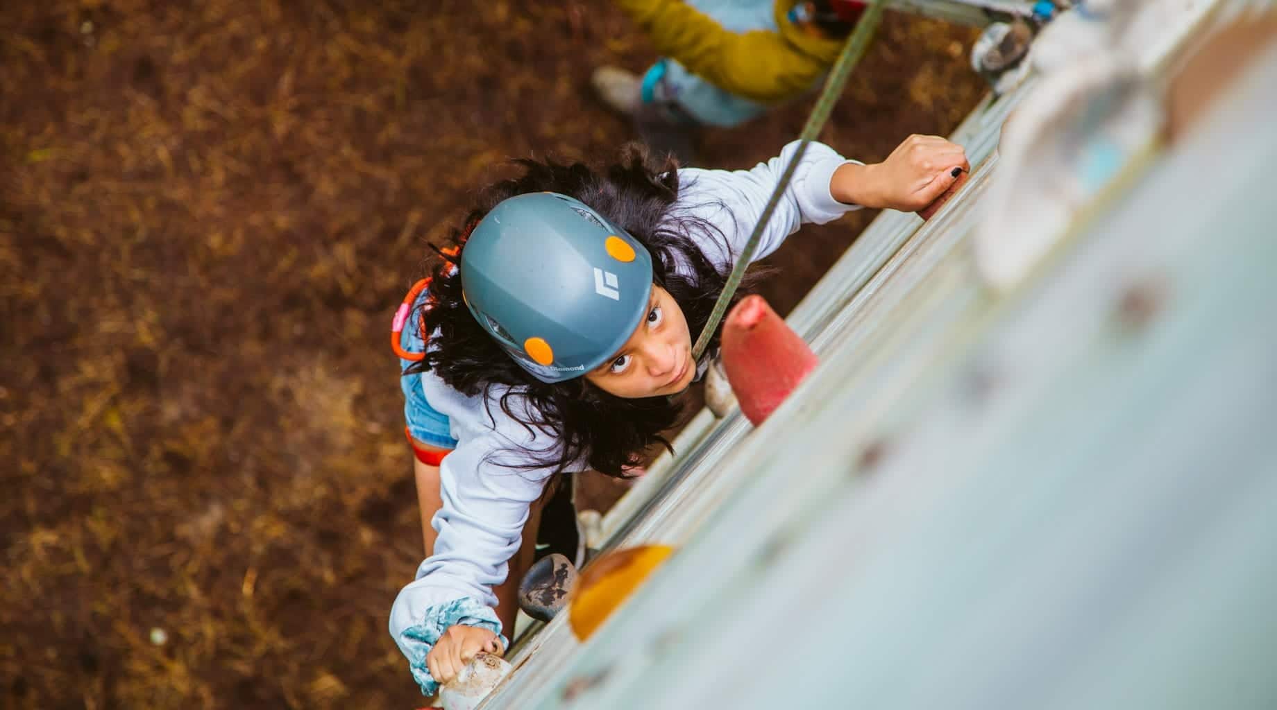 Girl on climbing tower