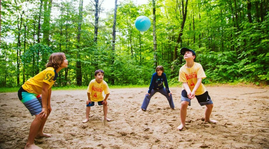 Boys playing volleyball