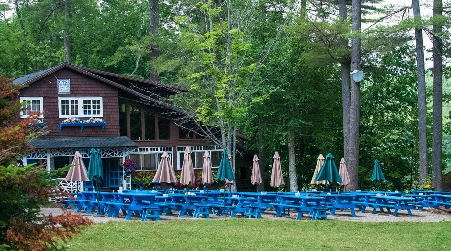 Dining hall and picnic tables set up outside