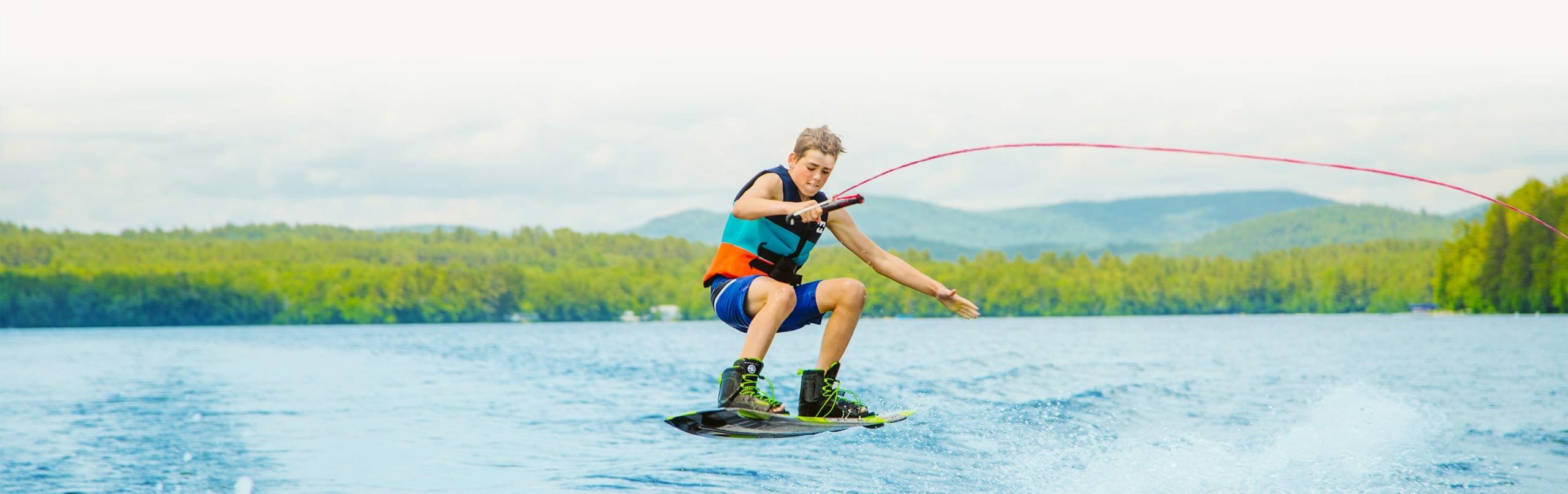 Camper doing a wakeboarding trick